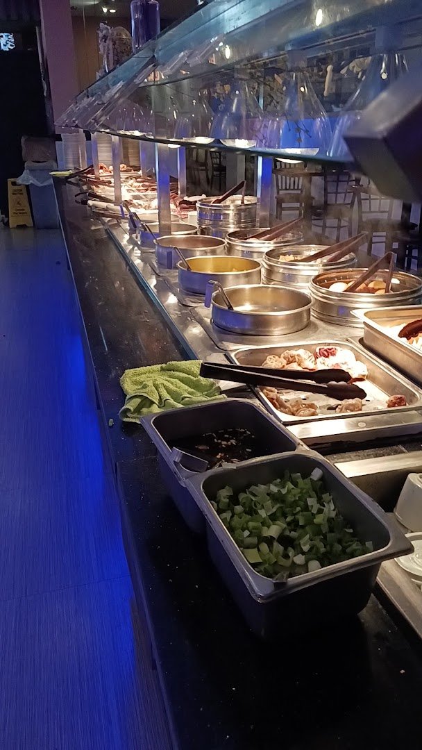 Dining tables set in a casual restaurant room.